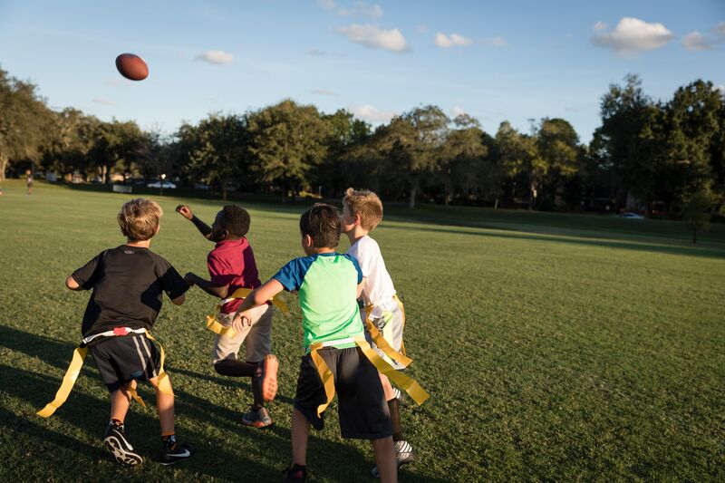 little kids playing flag football